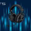 Cuffie Logitech G Pro X 2 Lightspeed Cuffie compatibili con Playstation 5 con uno sfondo tech che mostra onde sonore di colore blu